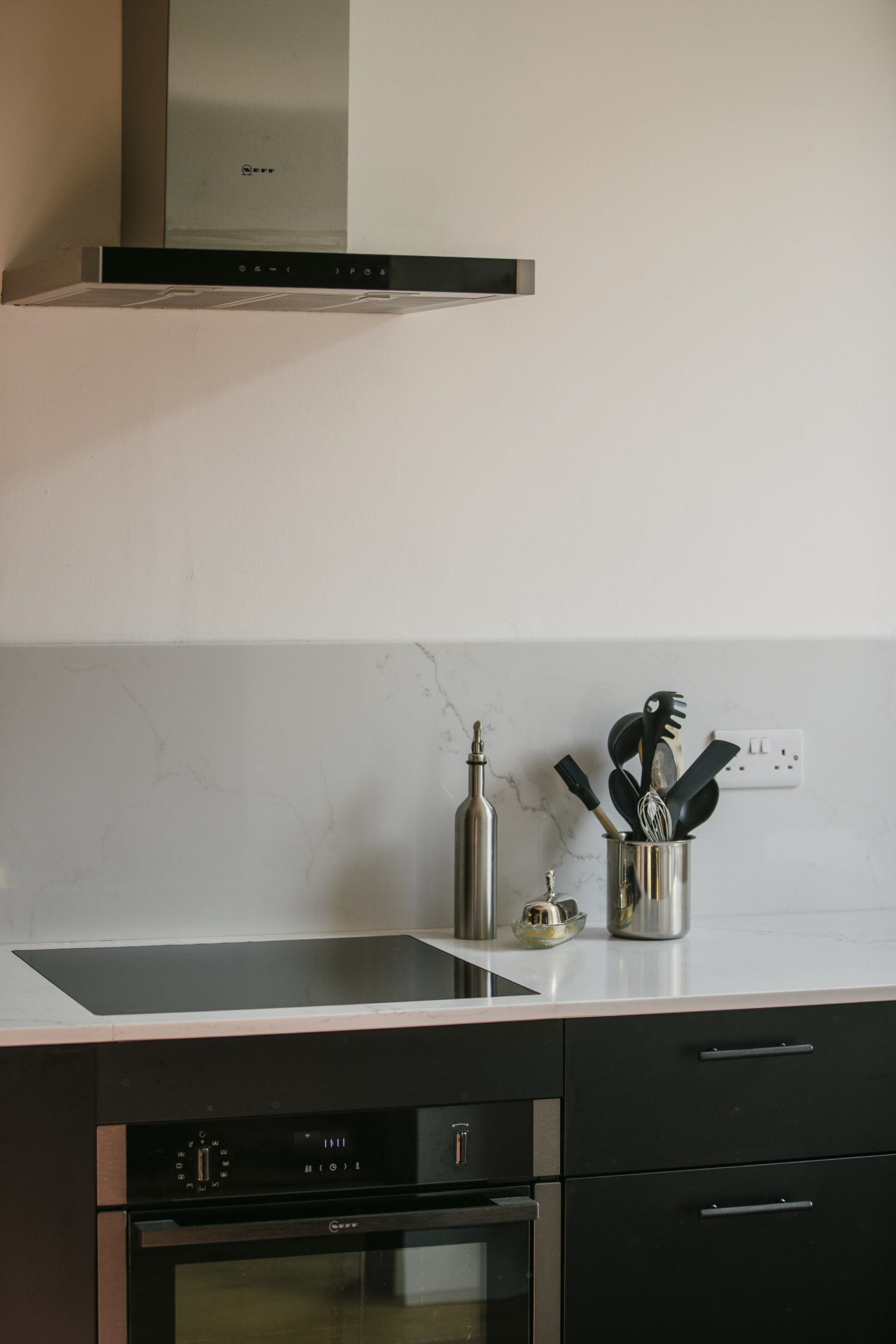 Alteration of a New Town Edinburgh apartment. A new contemporary kitchen is open plan to living room. Calum Duncan Architects Edinburgh. Energy improvements using low carbon low toxicity natural materials.