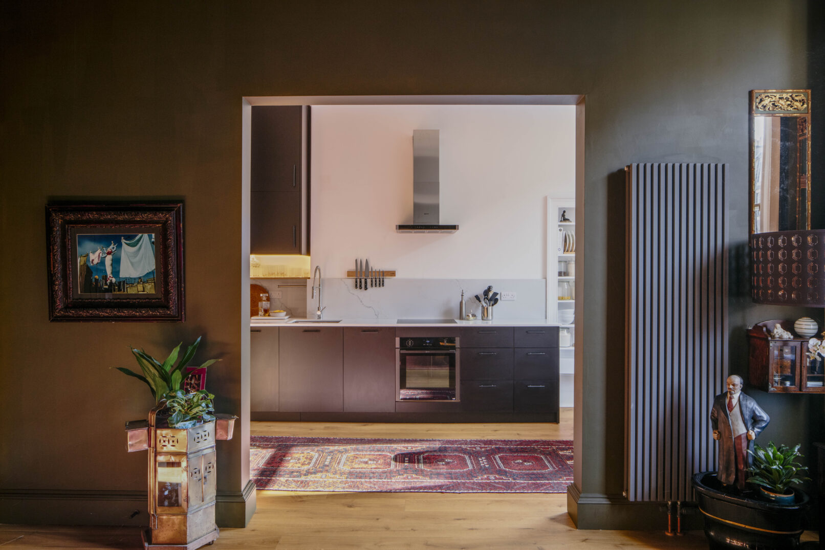 Alteration of a New Town Edinburgh apartment. A new contemporary kitchen is open plan to living room. Calum Duncan Architects Edinburgh. Energy improvements using low carbon low toxicity natural materials.